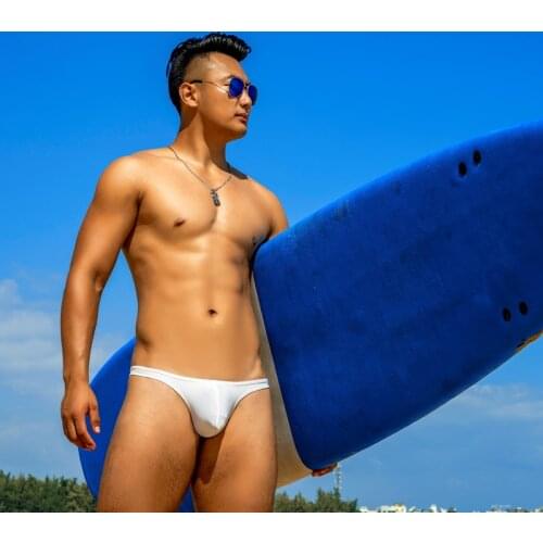 WD297 Tight low waist half pack hip swimsuits men solid white sexy men swimwear bikinis hot gay men thong swim trunks briefs