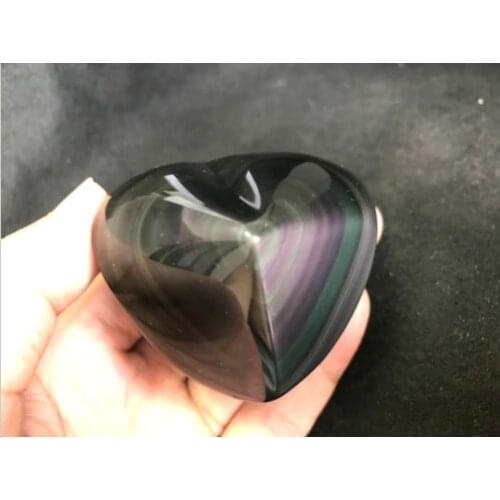Natural rainbow obsidian hand-carved hearts as gifts