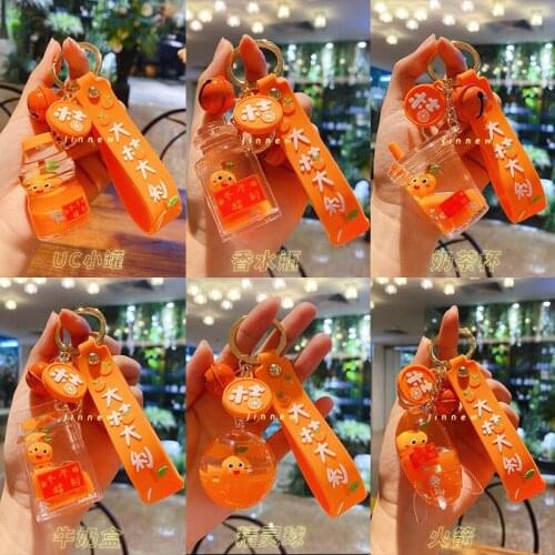 2021 New New Year Popular Spring Festival Daju Italian Oil Floating Doll Keychain Orange Small Gift Wholesale