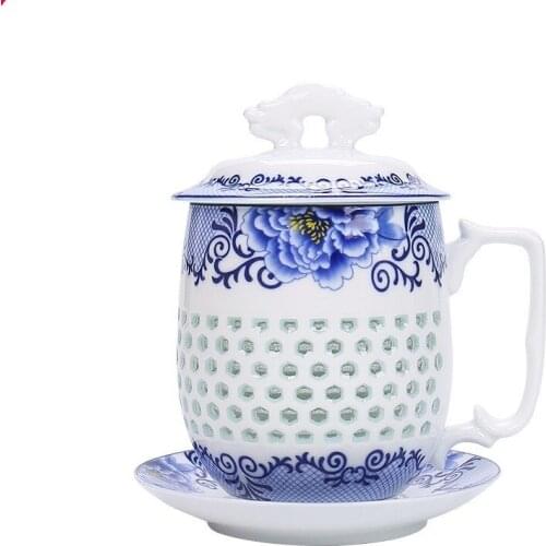 Hollow tea mug with saucer lid porcelain tea set office cup tea cups China ceramic mug