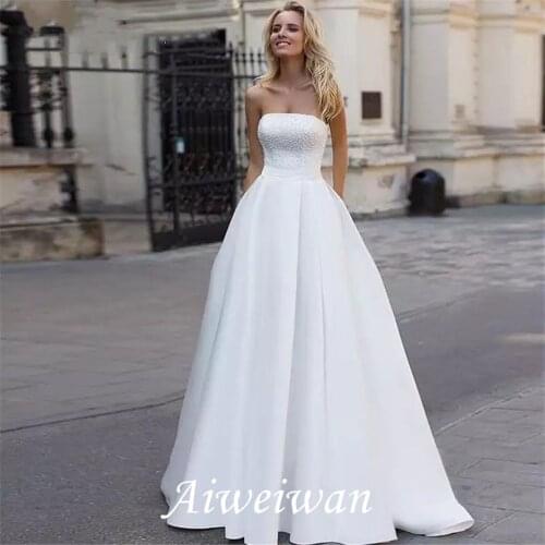 A-Line Wedding Dresses Strapless Court Train Satin Sleeveless Simple with Beading 2021