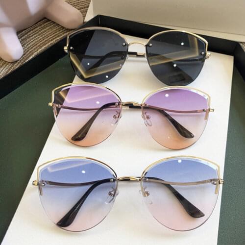 High Quality womens Oval Cat Eye Sunglasses Lady Metal Rimless shades Luxury Sunglasses Female Driving Glasses zonnebril dames