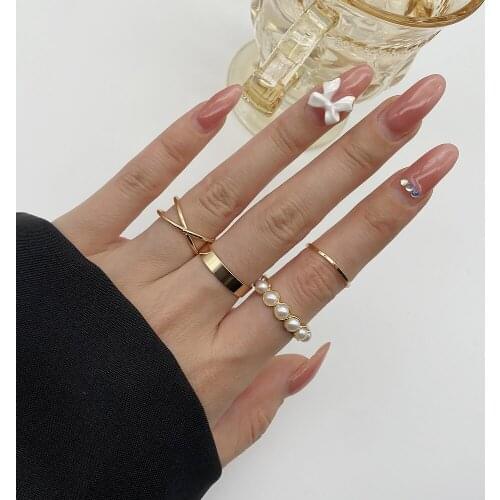 4pcs European and American Fashion Temperament Creative Punk Style Golden Ring Inlaid Pearl Joint Metal Cross Ring Set