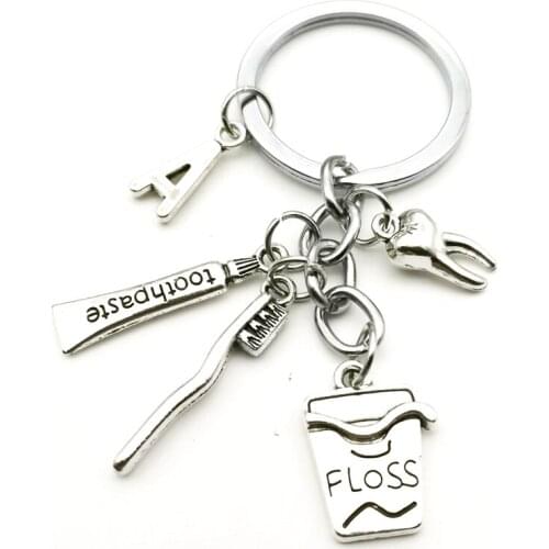 New Teeth Health Experts Mixed Floss Toothbrush Toothpaste Toothpaste Pendant 26 Letters Men and Women Car Key Ring Jewelry Gift