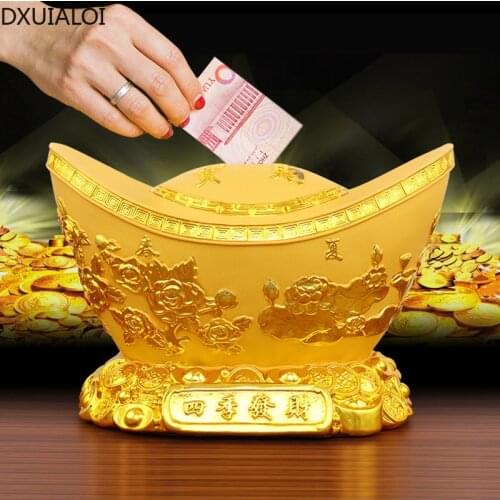 DXUIALOI simple creative golden piggy bank resin crafts new store opening gift company living room coffee table decoration