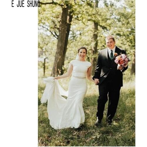 E JUE SHUNG White Country Mermaid Wedding Dresses Cap Sleeve Jewel Neck Backless Crystal Sashes Bridal Dresses robe de mariee