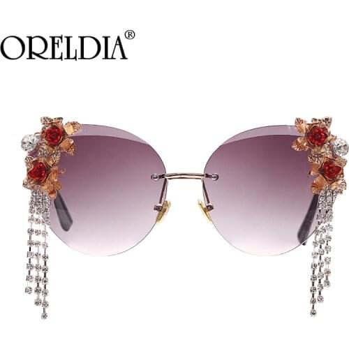 Luxury Tassel Rhinestones Sunglasses Women Fashion Cat Eye Rimless Diamond Flower Sun Glasses Lady Brand Designer Eyewear UV400