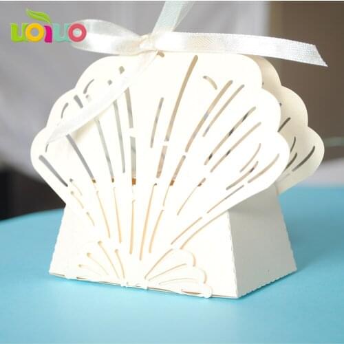 50pcs shell cream Decorated Hollow Laser Paper Wedding Box Laser Cut Chocolate Mariage Favors And Gifts Birthday