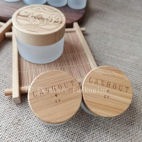 Wholesale Custom Logo Beauty Glass Jars For Cosmetics Containers With Bamboo Lid Face Cream Makeup Lip Gloss Packaging Jars