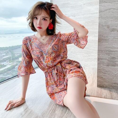 Awarose Summer Thin Embroidered V-neck Flared Sleeves Wide Leg Shorts Jumpsuit Women Vintage Print Elastic High Waist Playsuits