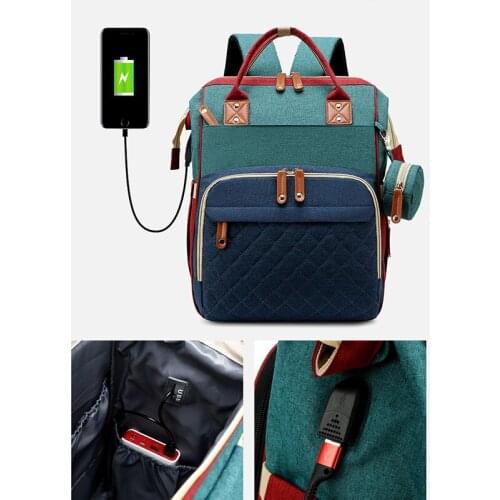 Baby Diaper Backpack Foldable Baby Crib With Changing Pad And Stroller Strap Large Capacity Waterproof Stylish Portable Baby Bed