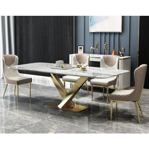 Nordic marble luxury dining table and chair combination Post-modern minimalist Italian dining table stainless steel rectangular