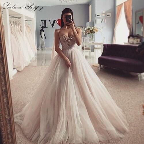 Lceland Poppy Sexy A-line Tulle Wedding Dress 2020 Vestido de Noiva Beaded Floor Length Sleeveless Bridal Gowns with Sash