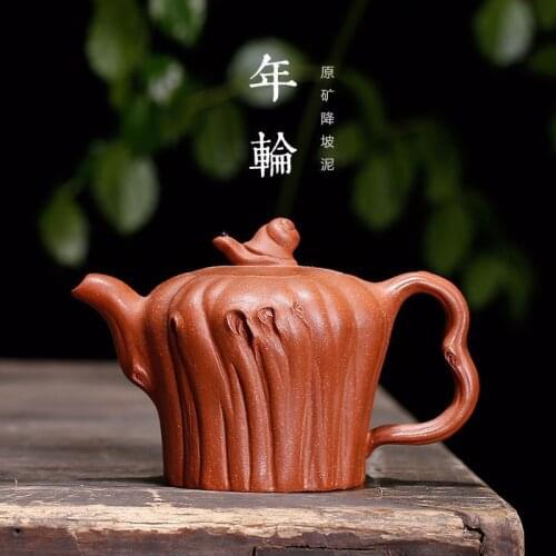 A bionic pot maker, handcrafted with tree stumps and galls for downhill mud annual rings in Yixing Zishahuyuan Mine