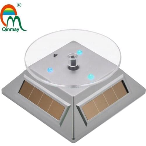 LED seven color rotating display table solar or battery-powered rotating disc