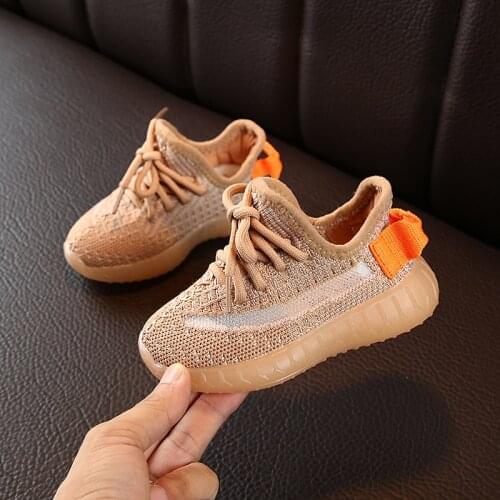 Childrens casual sports shoes 2021 summer new mens womens flying woven breathable non-slip luminous running shoes size 22-30