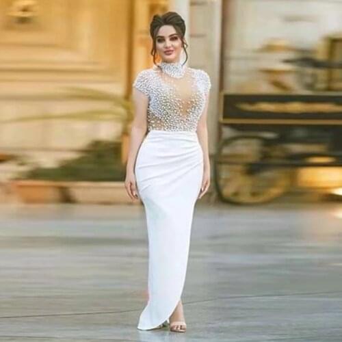 2020 White Short Sleeves Mermaid Prom Dresses Arabic Pleats Sheer Illusion Sexy High Neck Pearls Beading Evening Gowns LE4057