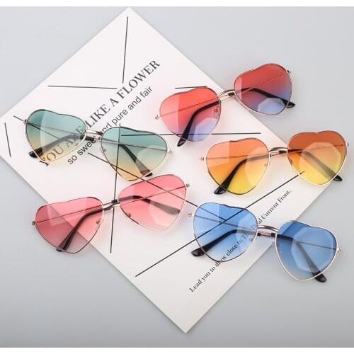 New Fashion Sexy Ladies Heart Shaped Sunglasses Metal Women Brand Designer Fashion Rimless Clear Ocean Lenses Sun Glasses
