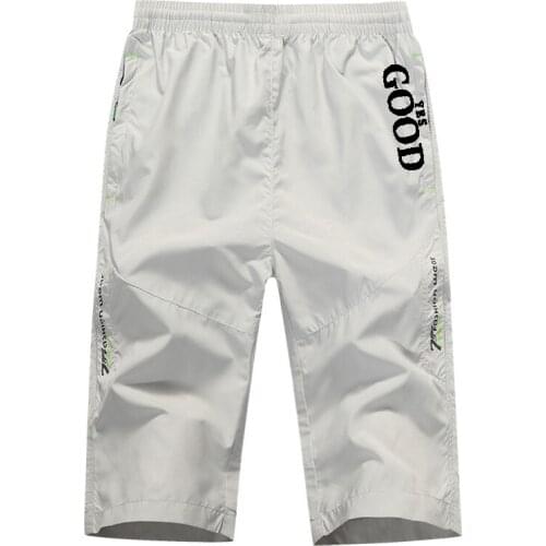 Summer Elastic Waist Men Shorts 2021 Solid Casual Men Short Pants Overalls Black White Shorts Fashion Men Clothing Quick Dry