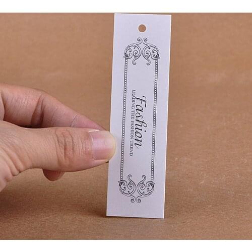 Free shipping customized hang tags/300gsm coated paper paper tags/garment printed tags/labels 200 pcs a lot