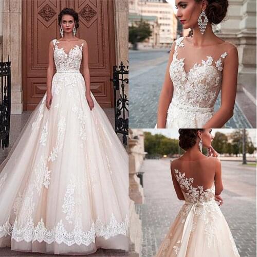 2020 Sleeveless A-Line Champagne Wedding Dreses Illusion Design with Iovry Appliques Vestido De Noiva