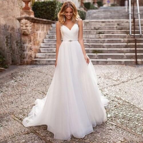 Modest Organza A-line Wedding Gowns 2021 Sweep Train Pleats V-neck Sleeveless Bridal Dresses with Beading