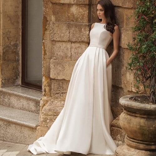 A-Line Satin Weddding Dresses O Neck Off Shoulder Fashion Pocktes Draped Button Floor Length 2020 New Arrival Luxury Bridal Gown