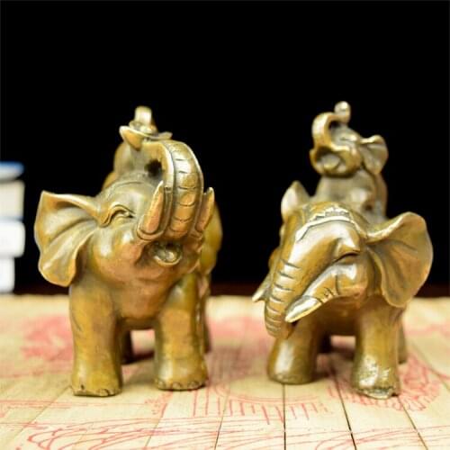 The copper like Brass Ingot like old antique brass elephant Zhaocai gold ornaments as the living room feng shui