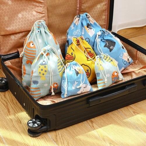 A set of three printed cotton and linen drawstring drawstring pockets, linen bags, miscellaneous underwear, travel storage bags
