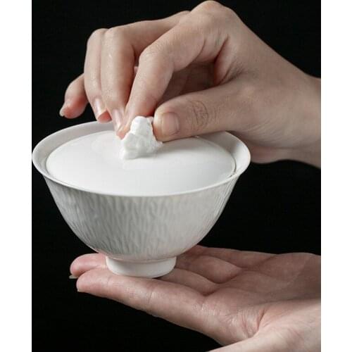 Taihu stone cover bowl Kung Fu tea set ceramic tea bowl Jade clay white porcelain hand-held tea bowl large tea infusers