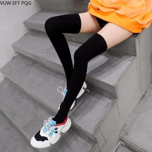 Autumn and winter female growth socks over the knee solid color campus style Japan warm silicone non-slip cotton business wear