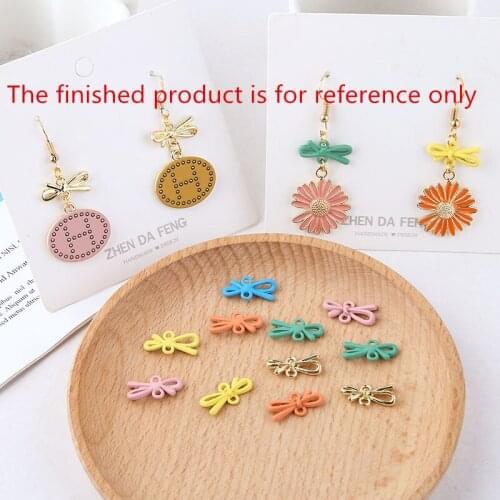 Diy jewelry making 50pcs/lot color Rubber paint cartoon bow knot shape alloy floating locket charms fit earring accessory
