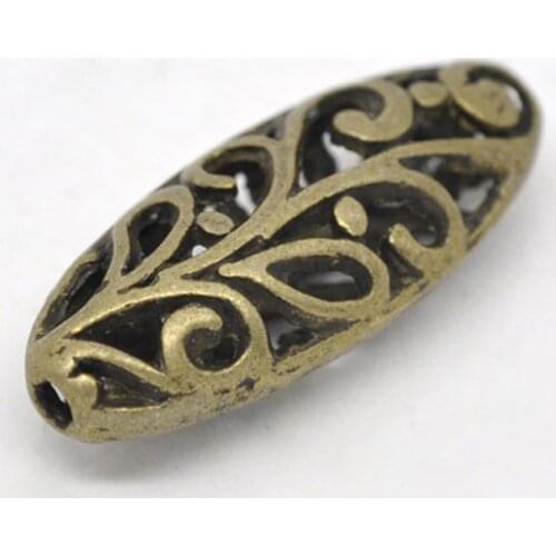 DoreenBeads Zinc alloy Spacer Beads Oval Antique Bronze Flower Hollowcolor DIY Jewelry About 23mmx9mm,Hole:Approx 1.2mm,2 Pieces