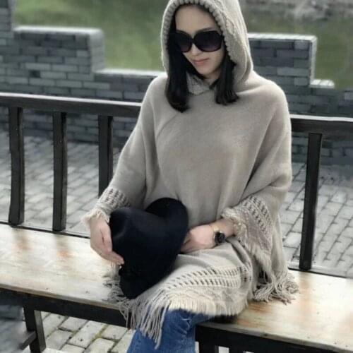 Autumn and winter Korean version of the hooded fringed hollow knit sweater shawl cloak pullover blouse womens all-match