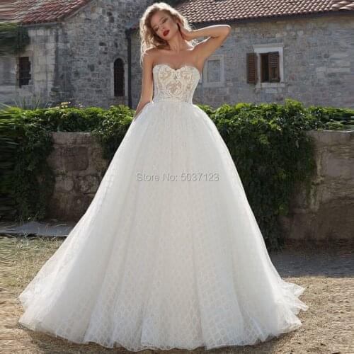 Ball Gown Wedding Dresses Sweetheart Sleeveless Lace Appliques Sweep Train Bridal Wedding Gown Vestido De Noiva Custom Made