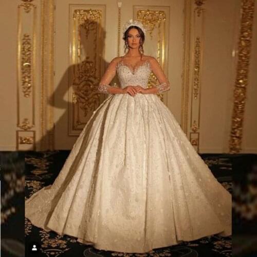 Saudi Arabia A Line Wedding Dresses Lace Appliques Beads Sheer Long Sleeves Bridal Gowns Vestido De Novia Sweep Train