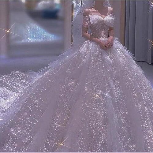 Luxury White Wedding Dresses 2021 Sexy Spaghetti Straps Illusion Sweetheart Princess Shiny Lace Applique Big bow Bridal Gown New