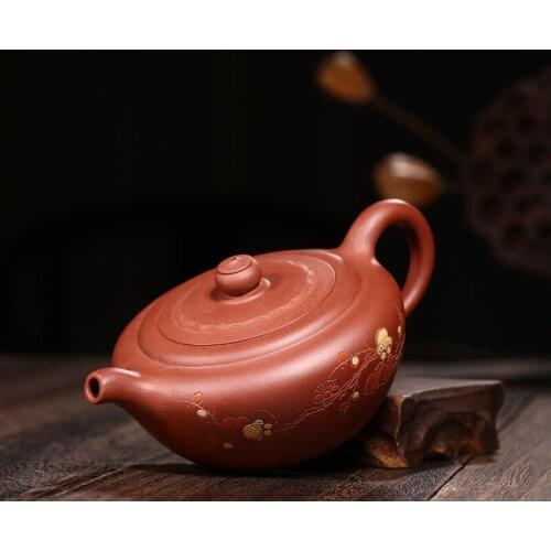Yixing ores are recommended by the pure manual cold plum purple clay teapot tea set home office kungfu proud snow