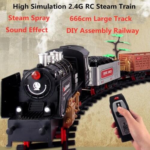 High Simulation Smoking Steam Spray 2.4G RC Steam Train Model With sound light Driving 666CM Track DIY Assembly Chimney Railway