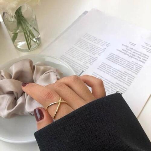 New stainless steel two-color X-shaped male and female couple ring daily personality simple fashion trend adjustable gift