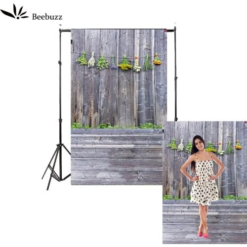 Gray wooden board background Photography studio photophone Pictures model portrait photo Green plant decorative wall