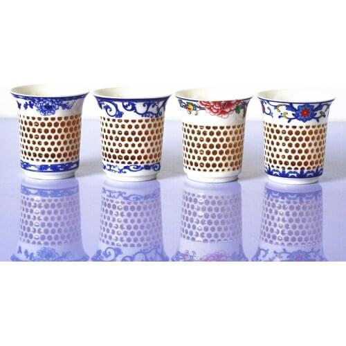 Ceramic exquisite ice crystal water cup Jingdezhen blue and white large teacup hollow master cup Japanese water cup high white