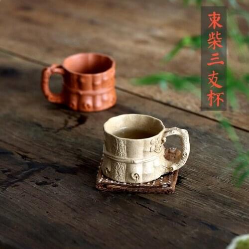 Yixing recommended kung fu tea set small sample tea cup mug cup bowl down slope mud sesame Duan Sanyou cup by hand