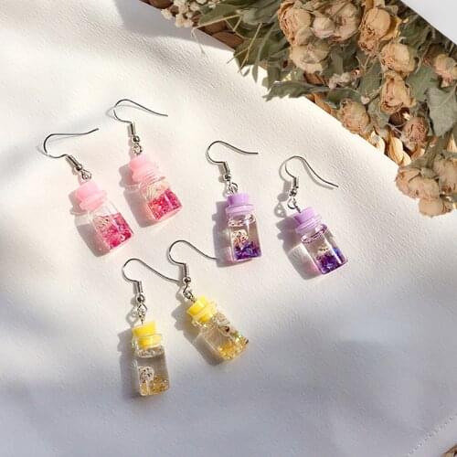 Japanese and Korean simple creative harajuku sea shell bottle earrings interesting personality girl do strange drop earrings