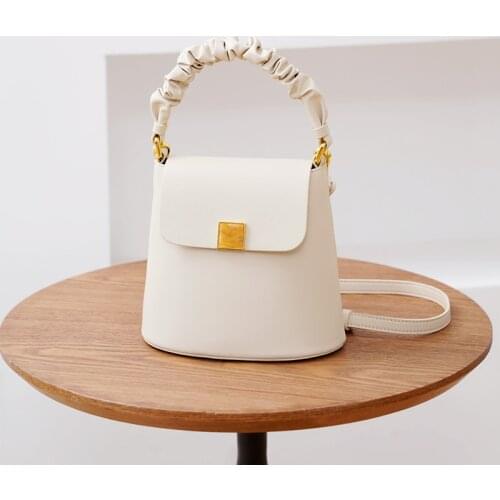 Premium sense small bag 2021 new trendy bucket bag fold handbag female summer shoulder messenger bag leather female bag