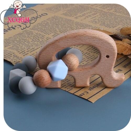 XCQGH 1Pcs Elephant Beech Wooden Baby Teether Bracelet Infant Newborn Rattle Nursing Teethers