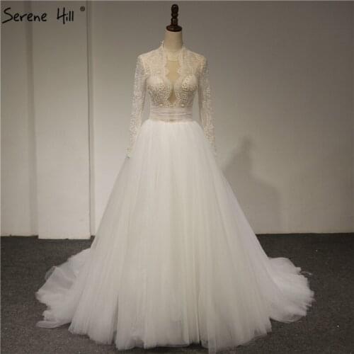 White Vintage Long Sleeves Sexy Wedding Dresses 2020 New Pearls Lace Fashion High-end Bridal Gowns Real Photo