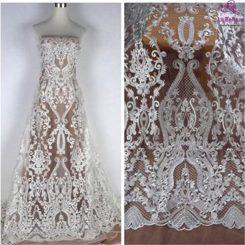 La Belleza new lace fabric,heavy embroidery bridal lace fabric,polyester with clear sequins large patterns lace fabric 1 yard