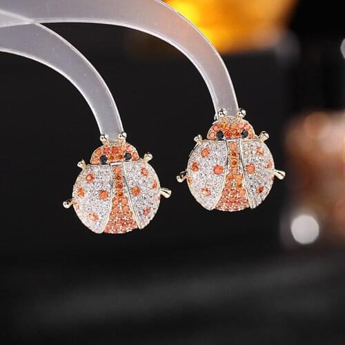 And American advanced sense of fashion and personality color zircon earrings gold heavy beetle insect stud earrings