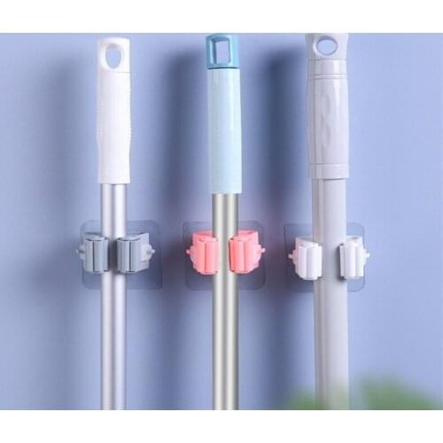 Powerful and seamless sticky hook stickers bathroom storage mop hook creative door rear plastic hook free punch mop holder